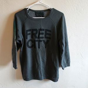Green FREECITY sweatshirt with elbow patches